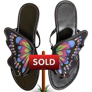 Butterfly Accent Black Slip-On Sandals - Women.
Unbranded nwt it’s to big for me